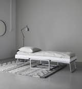 Bedroom, Rug Floor, Bed, Floor Lighting, and Lamps  Photo 1 of 12 in 10 Functional Pieces For Small Space Living