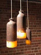The US debut of the cork-and-silicone Loev pendants by Dutch industrial designer Renate Vos, who is quickly making a name for mixing unusual materials to bold effect. Spotted at Wanted.&nbsp;