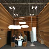 Molo, based in Vancouver, brought their ingenious booth system to ICFF. The walls are constructed of paper, and once the show concludes, it folds up for travel back to the studio. The cloud-like pendants are counter-balanced by hanging weights.&nbsp;