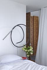 A Structures S7 lamp from Ameico lights the master bedroom.