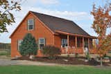 Shawnee Structures offers prefabricated log homes with pine interiors and T&amp;G pine floors.