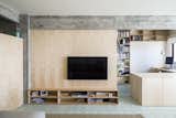 The living room is defined by a large birch plywood television console, designed by architect, Miguel Marcelino.
-
Lisbon, Portugal
Dwell Magazine : July / August 2017