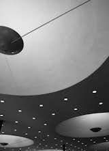 Saarinen’s overhead lighting was unusual: Concave expanses hold custom fixtures, while a constellation of smaller embedded bulbs plays up the feeling of space.
-
Columbus, Indiana
Dwell Magazine : July / August 2017  Photo 5 of 15 in Ode to a Forward-Thinking America: Columbus, Indiana