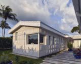 A 450-square-foot addition reconfigured the ranch house from an  L- to a U-shape.
-
Miami, Florida
Dwell Magazine : July / August 2017