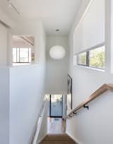 Staircase and Wood Railing A George Nelson Bubble lamp hangs in the stairwell.
-
Santa Monica, California
Dwell Magazine : July / August 2017  Photo 10 of 14 in A Family’s Cramped Bungalow Is Replaced With an Accessible and Affordable Prefab