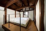 The second floor bedroom is surrounded by clay walls.  A tatami and futon provide sleeping quarters for two people; a mattress is available, too.