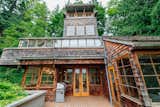 Repurposed Ship Materials and 100-Year-Old Beams Make Up This Tree House-Like Home - Photo 17 of 18 - 