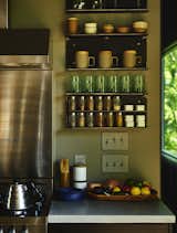Kitchen, Range, and Open Cabinet The kitchen’s concrete countertop is by Dex Industries.


Scaly Mountain, North Carolina
Dwell Magazine : September / October 2017  Photo 3 of 12 in A Rustic-Modern Cabin Inspired by Japanese Bungalows and Shou Sugi Ban