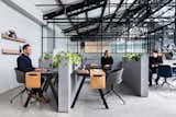 Office, Study Room Type, Chair, Desk, Shelves, and Concrete Floor Here are eight ways to turn your space into a warm, welcoming oasis that helps you get your work done while reflecting your personal style.    Photos from An Art Deco Warehouse in Melbourne Is Converted Into a Shared Office Space