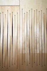 A screen of milled bent birch plywood conceals acoustical panels. Like the undulating ceiling, the screen’s wave-like design helps refract sound.
-
New Haven, Connecticut
Dwell Magazine : September / October 2017  Photo 12 of 20 in A 1905 Fire Station in Connecticut Is Converted Into a Community Hub for Art and Music