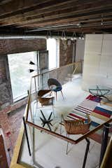 It’s accessible from a mezzanine.
-
New Haven, Connecticut
Dwell Magazine : September / October 2017  Photo 15 of 20 in A 1905 Fire Station in Connecticut Is Converted Into a Community Hub for Art and Music