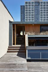 Outdoor, Rooftop, Wood Patio, Porch, Deck, and Decking Patio, Porch, Deck The clerestories, located on the roof deck near the prefab addition, fill the loft with light.
-
New Haven, Connecticut
Dwell Magazine : September / October 2017  Photos from A 1905 Fire Station in Connecticut Is Converted Into a Community Hub For Art and Music