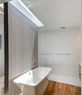 Bath Room and Freestanding Tub  Photo 11 of 12 in A Refined Austin Home With Verdant Views Asks Just Under $2M