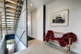 Staircase and Wood Tread  Photo 3 of 12 in A Refined Austin Home With Verdant Views Asks Just Under $2M