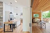 Kitchen, Pendant Lighting, Refrigerator, and Ceramic Tile Backsplashe  Photo 7 of 14 in An Austin Couple Turn a Ranch Home Into a Refreshing Live/Work Space