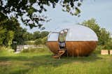 Based on the travels of a beloved French naturalist, Mr. Plocq's Caballon is an egg-shaped cabin that takes cues from both naval and aircraft carpentry.