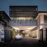 Garage  Photo 1 of 12 in 102 Potted Olive Plants Cover the Facade of This Bangkok Home