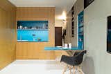 Kitchen, Drop In Sink, Open Cabinet, Colorful Cabinet, and Wood Cabinet  Photo 6 of 8 in A Tiny Apartment in Slovakia Makes Clever Use of Space
