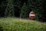 In the woods of Malborghetto Valbruna in the Italian Dolomite commune of Tarvisio reside a pair of egg-shaped tree houses.