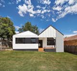 Exterior, House Building Type, and Gable RoofLine The 2,691-square-foot home was given an entire new roof and facade at the rear.  Photo 3 of 13 in A New Hip Roof Rejuvenates a California-Style Bungalow in Melbourne