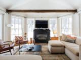 Living Room, Ottomans, Sofa, Chair, Coffee Tables, Standard Layout Fireplace, Lamps, Floor Lighting, Table Lighting, and End Tables  Photo 4 of 20 in 7 Best Houses You Can Rent in the Catskills This Holiday Season