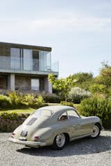 Nick’s passion for midcentury design extends to cars. His 1959 Porsche 356A coupe is parked in the driveway.

Pett Level, England
Dwell Magazine : November / December 2017