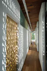 Light passing through the perforated shutters animates the upstairs.
-
Austin, Texas
Dwell Magazine : November / December 2017
