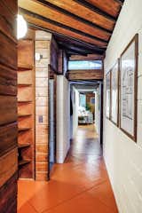 Hallway and Concrete Floor  Photo 6 of 11 in Live Out Frank Lloyd Wright’s Usonian Vision in This Home That’s Asking $725K