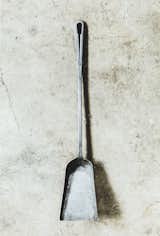 The completed shovel, part of a set of fire tools that Howard custom makes, takes about four-and-a-half hours to weld and measures 23 inches. The utilitarian design is inspired in part by the I-beams used to make buildings.  Photo 4 of 14 in Meet a Seasoned Blacksmith Who Reveals His Art's Painstaking Process