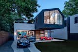 Exterior, Metal Siding Material, and Gable RoofLine  Photo 1 of 21 in This Austin Home Was Designed to Showcase a Vintage Car Collection