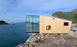 Exterior, Prefab Building Type, Tiny Home Building Type, Metal Roof Material, Wood Siding Material, Glass Siding Material, and Metal Siding Material  Photos from A New Book Reveals Some of the World's Most Incredible Vacation Rentals