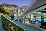 Exterior, Curved, Metal, Glass, House, and Beach House  Exterior Curved Beach House Photos from Oceanfront Wonder in Carmel Asks $11.4M