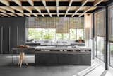 DADA VV Matte black lacquer, price upon request
In his kitchen design debut, Belgian architect-designer Vincent Van Duysen employs integrated sinks, multi-purpose drawers, and undertop trolleys held together by an aluminum load-bearing structure. With numerous configurations and designs, the featured kitchen includes steel base doors and a graphite oak adjacent worktop.