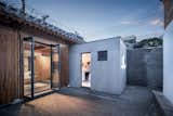 Outdoor and Small Patio, Porch, Deck Commissioned by a tech company, Dot Architects rehabbed a historic residence, outfitting it with moveable modules controlled by a smart TV and a new extension downloaded from the WikiHouse open-source system.  Photo 7 of 12 in A Smart TV Controls the Layout of This Futuristic Beijing Home