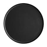 Tray by Vipp 
$95 
Following the success of Vipp’s matte-black soap dispenser, the Danish company introduced a sleek 13.4-inch-diameter tray. Though it’s meant for serving, the disc’s slip-resistant surface is well-suited to holding washroom accessories, too.