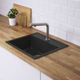 IKEA Hällviken sink 
$211
For a relatively low-cost splash of black in the kitchen, try IKEA’s Hällviken sink. The stone powder and acrylic basin is completely non-porous for easy cleaning.  Photo 12 of 32 in Watch Out For These Two Kitchen and Bath Trends in 2018