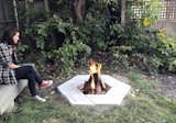 Outdoor, Back Yard, Hardscapes, and Grass  Photo 9 of 10 in Dwell Made Presents: DIY Stone Fire Pit
