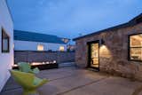 Outdoor, Concrete Patio, Porch, Deck, Back Yard, and Landscape Lighting  Photo 12 of 13 in In Arizona, a Modern Cube and Tumbledown 1930s Shack Make an Unlikely Couple