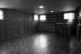 After contemplating adding a second floor above the kitchen to accommodate the master suite, Delano decided that situating it on the lower level, where the rec room and bar had been, was a better—and more affordable—choice