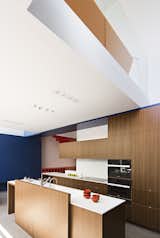 Custom cabinets by Myers Cabinetry have Corian countertops.