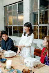 Marie Kondo gives a speech at dinner with Cuyana and Dwell.