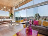 Living Room, Recessed Lighting, Ceiling Lighting, Sofa, Pendant Lighting, and Medium Hardwood Floor  Photo 1 of 12 in Potrero Hill Home by Dwell