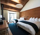 Forrest View Room. Redwoods, Pines and Eucalyptus are your neighbors, located within the main building surrounding the Great Room, offering a handcrafted bed and redwood deck.