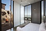 Bedroom, Concrete Floor, Pendant Lighting, Wall Lighting, and Bed  Photo 1 of 623 in ev by adalı from Encuentro Guadalupe