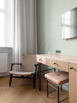 Bedroom, Chair, and Medium Hardwood Floor  Photo 4 of 8 in Nobis Hotel Copenhagen by Dwell