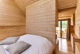 Bedroom, Bed, Medium Hardwood Floor, and Recessed Lighting  Photo 2 of 6 in Côte d'Azur Cave House by Dwell