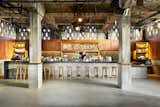 Dining Room, Bar, Concrete Floor, Pendant Lighting, and Stools  Photo 5 of 8 in Ace Hotel Los Angeles by Dwell