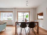 Dining Room, Track Lighting, Chair, Medium Hardwood Floor, and Table  Photo 3 of 7 in Sonder Old Town by Dwell