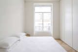 Bedroom, Night Stands, Bed, and Light Hardwood Floor  Photo 5 of 8 in Quai d'Orléans by Dwell