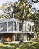 Exterior, House Building Type, Glass Siding Material, Flat RoofLine, Metal Siding Material, Mid-Century Building Type, and Wood Siding Material  Photos from Once Covered in Mold, a Midcentury Gem Outside Chicago Is Reborn